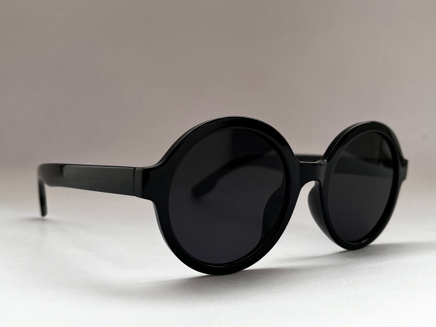 BLACK ORBIT ROUND SHADES