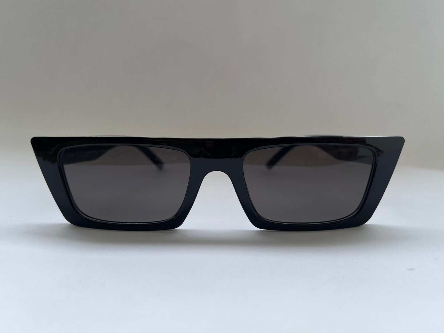 Black sunglasses with dark lenses