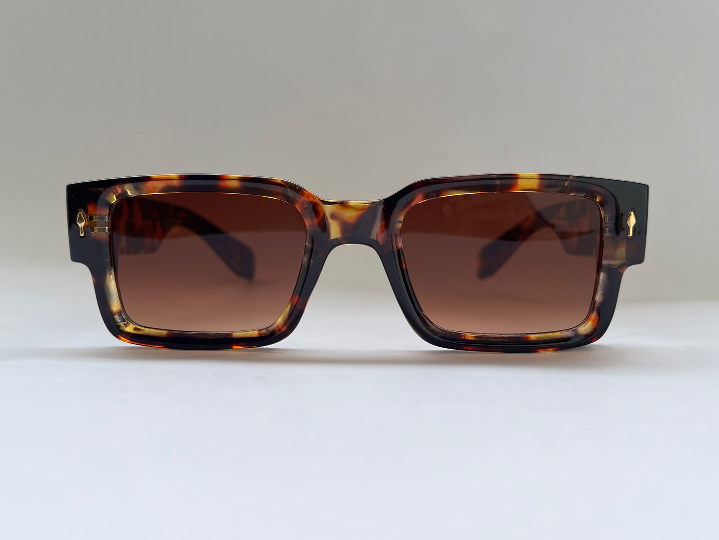 TORTOISE SHELL SUNGLASSES WITH BROWN FRAMES