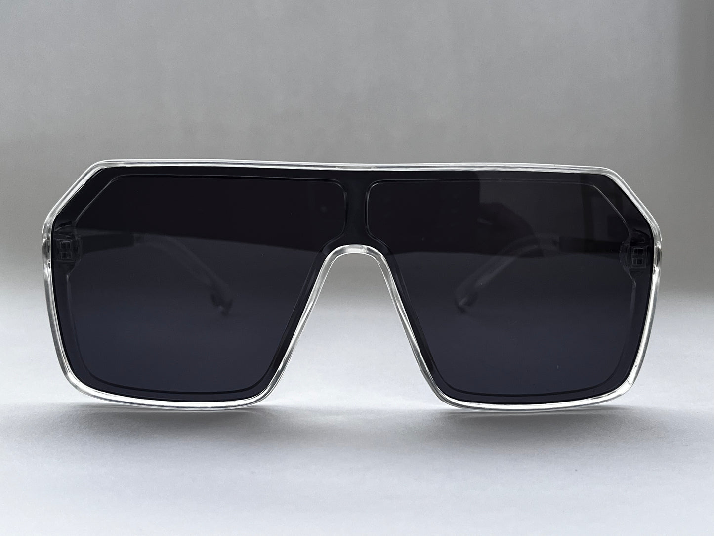 CLEAR FRAME STRIKING BLACK BOMBER SHADES
