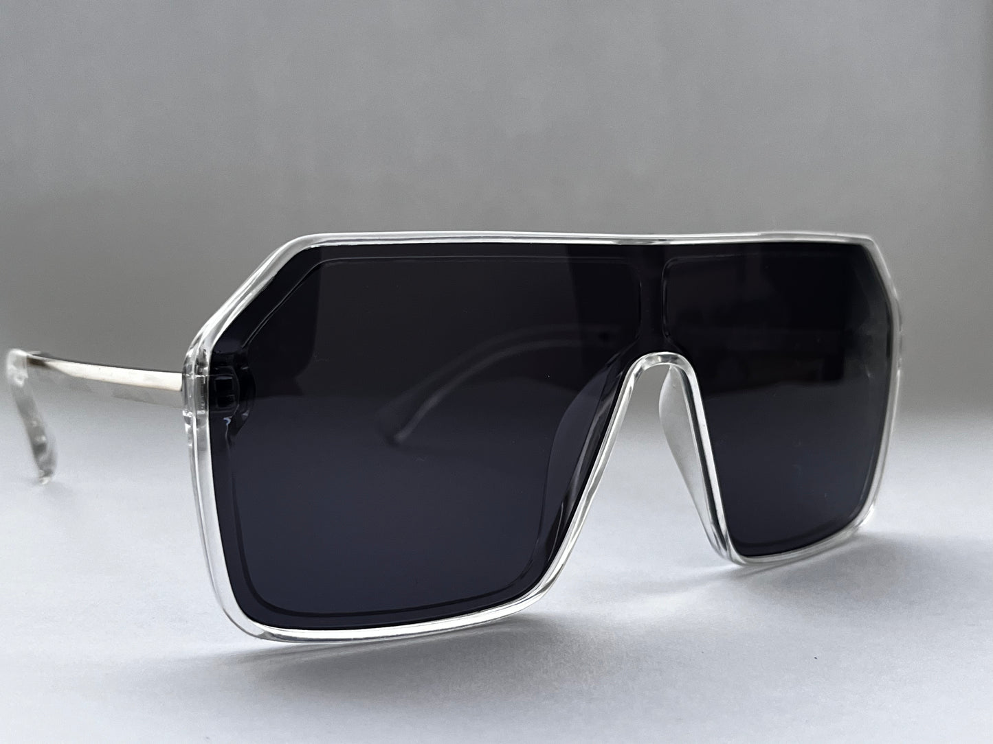 CLEAR FRAME STRIKING BLACK BOMBER SHADES