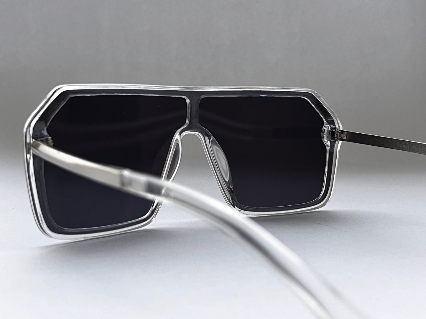 CLEAR FRAME STRIKING BLACK BOMBER SHADES