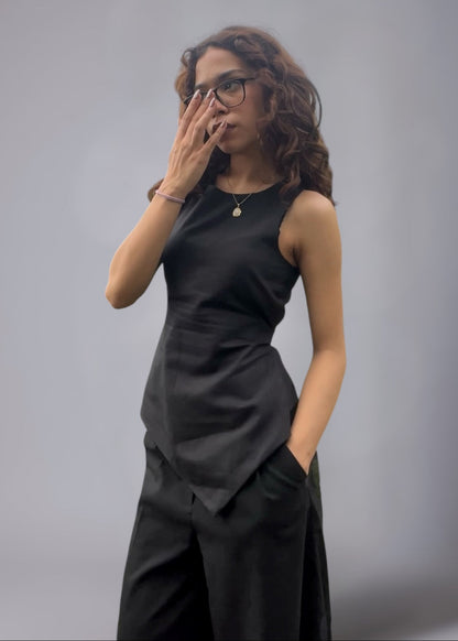 Black asymmetrical terry cotton co-ord set with tie-up waist and wide leg tailored pants.