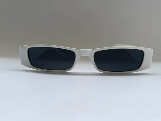 Sunglasses with dark lenses and white frame background