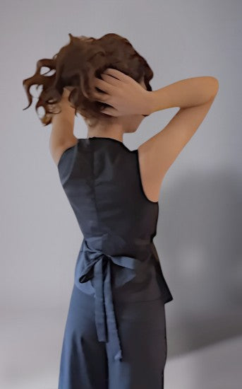 Black asymmetrical terry cotton co-ord set with tie-up waist and wide leg tailored pants.