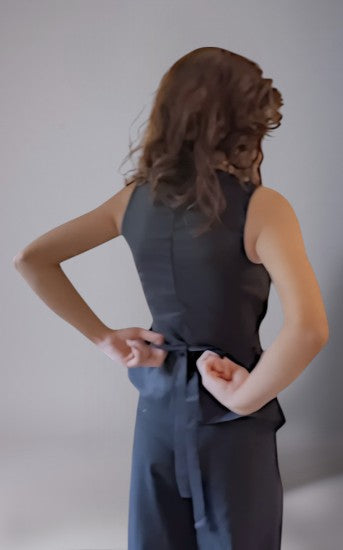 Black asymmetrical terry cotton co-ord set with tie-up waist and wide leg tailored pants.